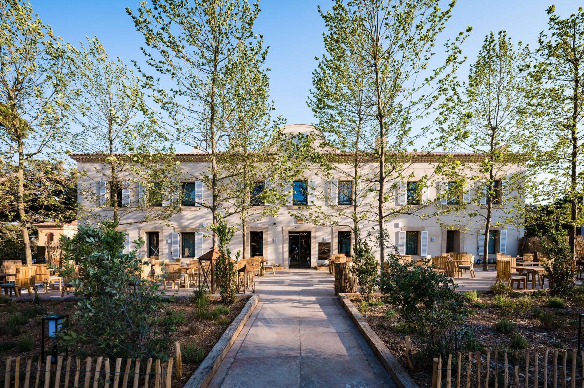 Le Hameau Des Pesquiers Ecolodge & Spa, Curio Collection By Hilton Hyeres Exterior photo The main entrance of the museum